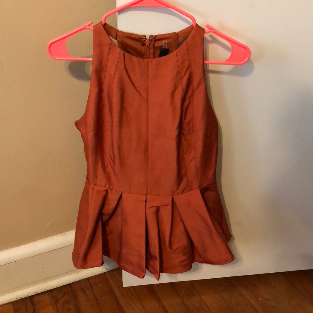 Ruffle bottom peplum shirt